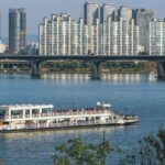 Cruise boat on the Han River with the Seoul skyline
