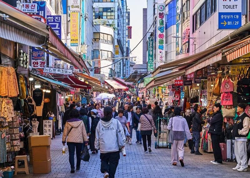 Busy shopping street inside Namdaemun Market in Seoul