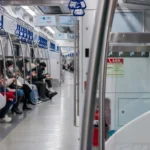 Passengers inside a Seoul subway train at Seoul Station