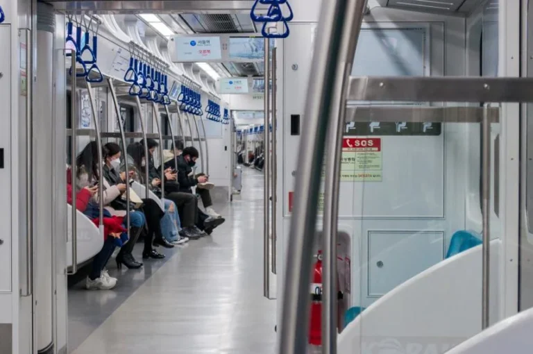 Passengers inside a Seoul subway train at Seoul Station
