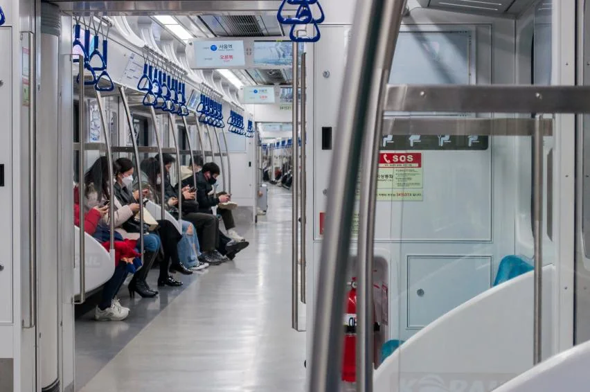 Passengers inside a Seoul subway train at Seoul Station