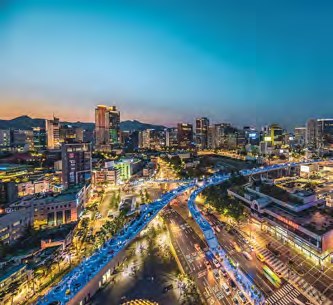 Central Seoul city streets and buildings illuminated at night
